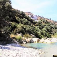 Het huis gezien vanaf de privélagune...